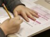 Il successo accademico della Gen Z sta silenziosamente riducendo i loro stipendi.